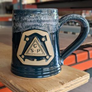 green custom coffee mug with logo