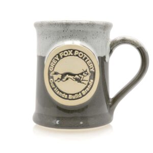 Peppercorn, our glossy, warm grey with black and white speckles, under a white rim glaze